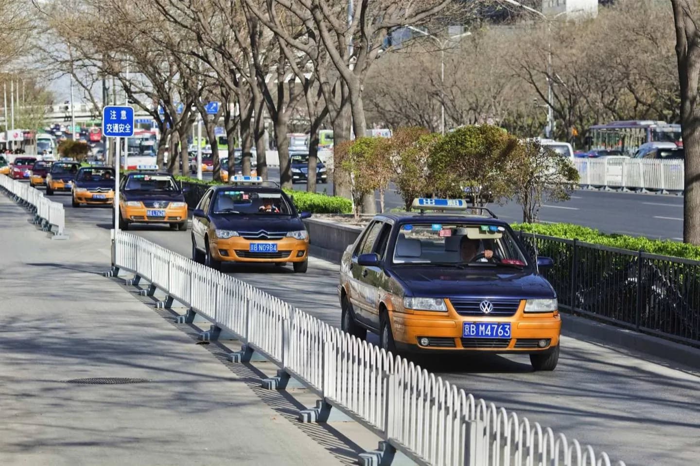 Usando taxis en Beijing · 2
