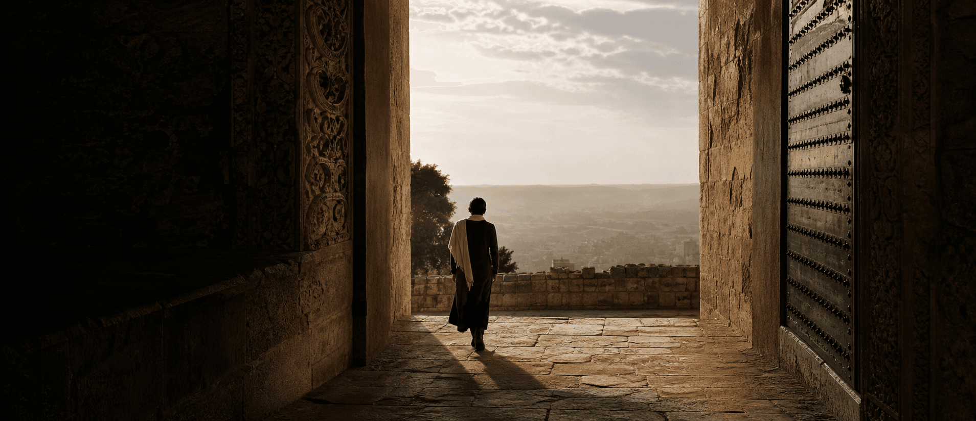 Placeholder editorial image of a distant person moving through an architectural passage